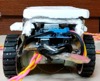 Arduino Based Floor Cleaning Robot Using Ultrasonic Sensor