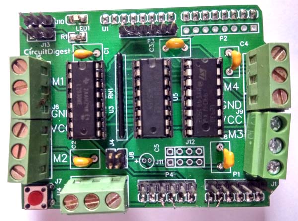Soldered components on DIY Arduino Motor Driver Shield PCB