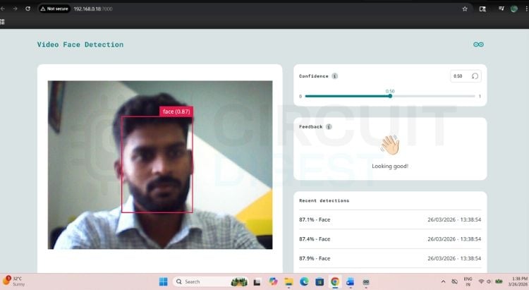 Live face detection running on Arduino UNO Q showing webcam feed with red bounding boxes and confidence scores