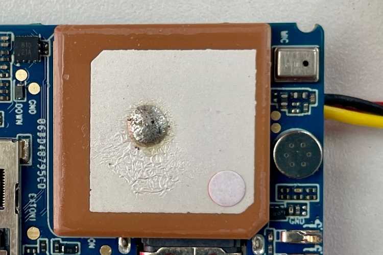 Ceramic patch antenna soldered directly onto the JioFind 4G PCB for GNSS reception
