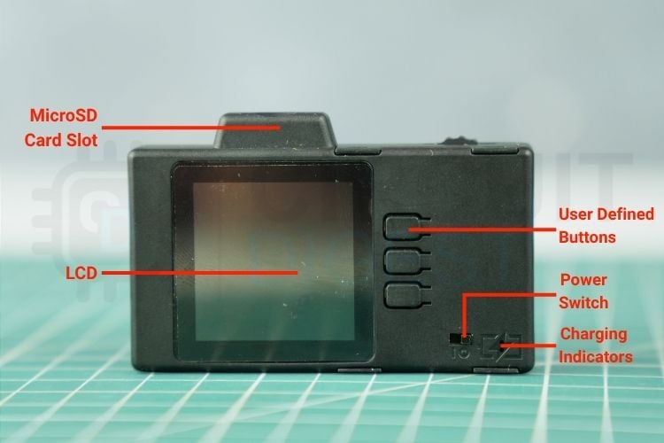 Display-side view showing the LCD, MicroSD slot, user buttons, power switch and charging indicators.