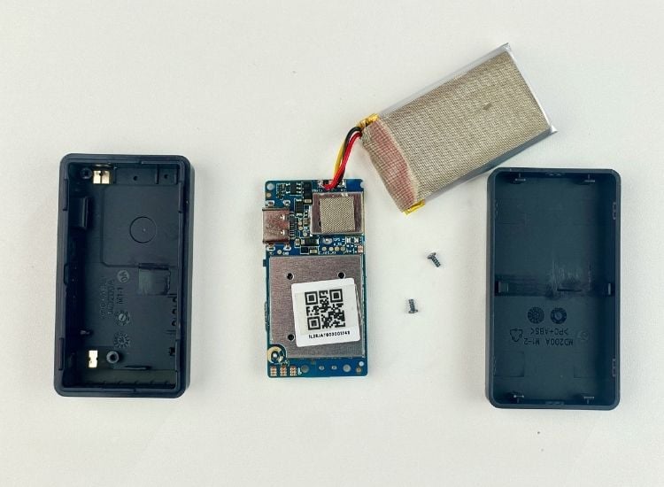 JioFind 4G disassembled showing PCB, battery, and enclosure separately