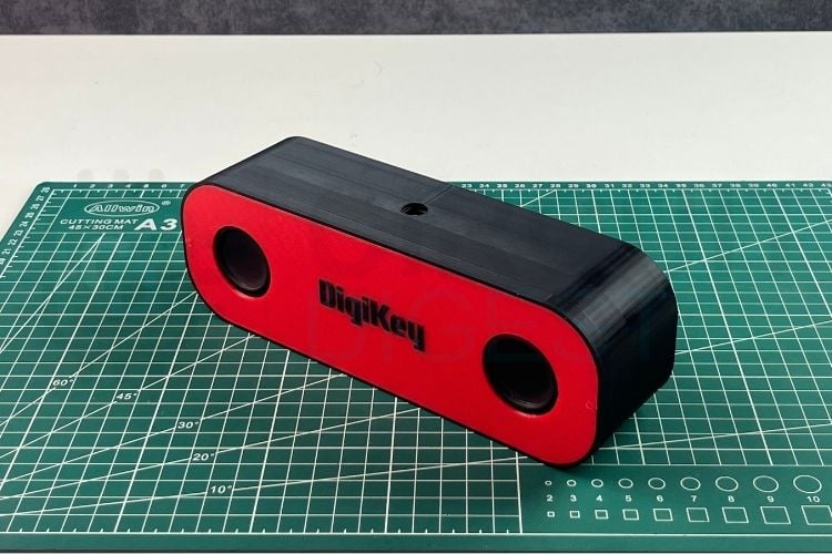 PUI AMP2X15 and two speakers being assembled into the custom 3D-printed enclosure