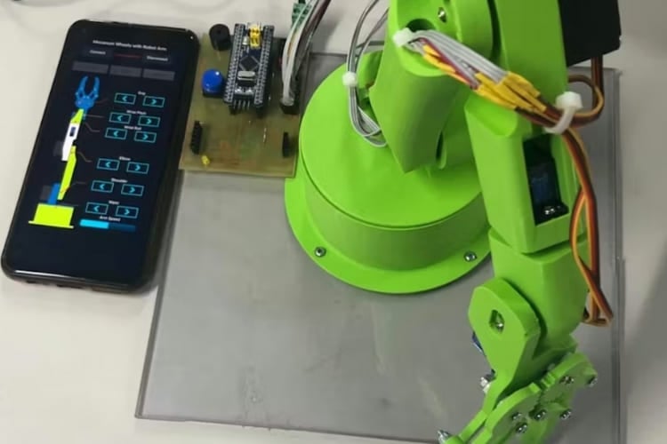 A 6-DOF robotic arm operated using STM32 and ESP32 modules with smartphone-based motion control.