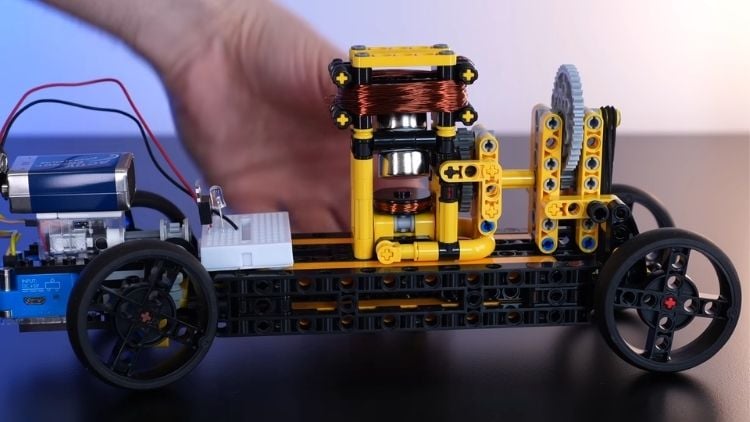 Self-Timing Electric Motor was installed onto a LEGO vehicle using a gear and belt drive system