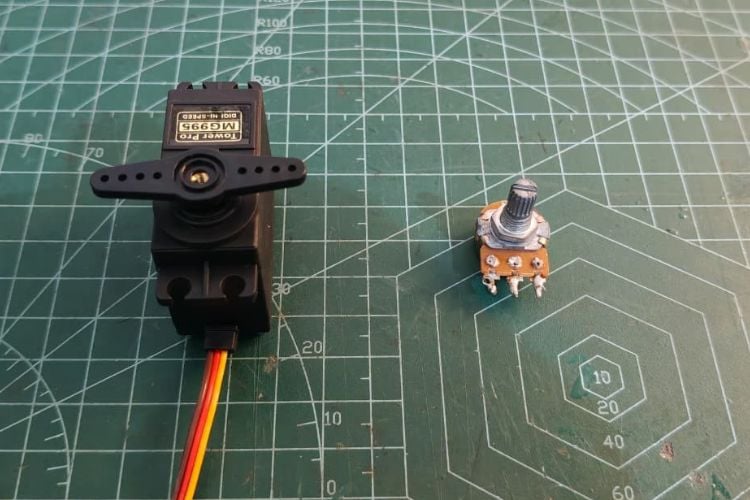 Servo Motors and Potentiometer to Control Robotic Arm