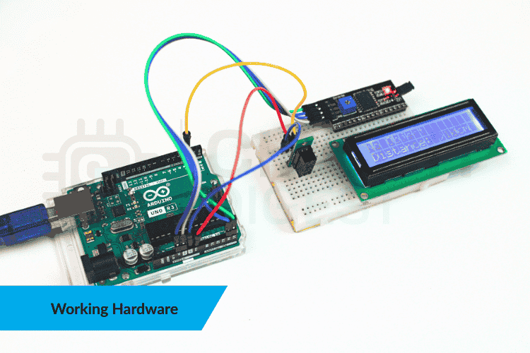 Assembled hardware setup showing GP2Y0D80Z0F sensor interfaced with Arduino Uno and LCD display in operation