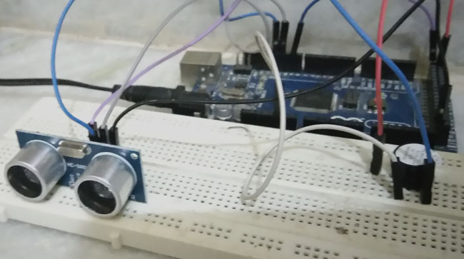 Door Alarm using Arduino and Ultrasonic Sensor Door Alarm using Arduino and Ultrasonic Sensor