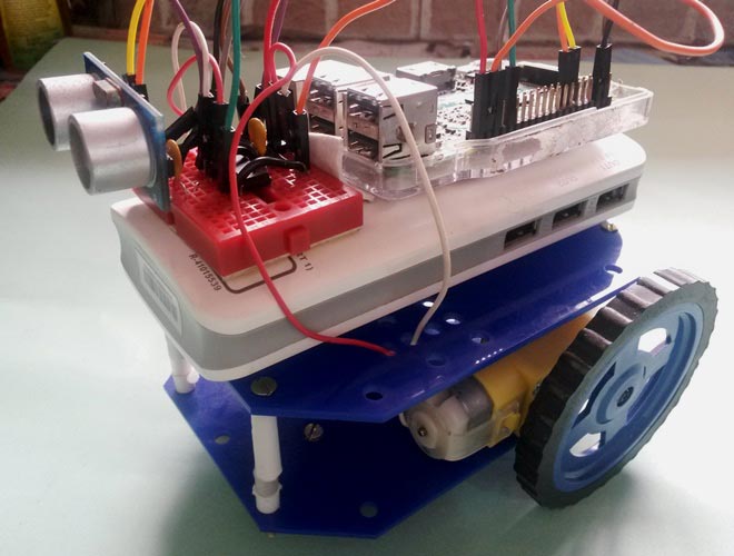 Obstacle avoiding robot cheap using raspberry pi