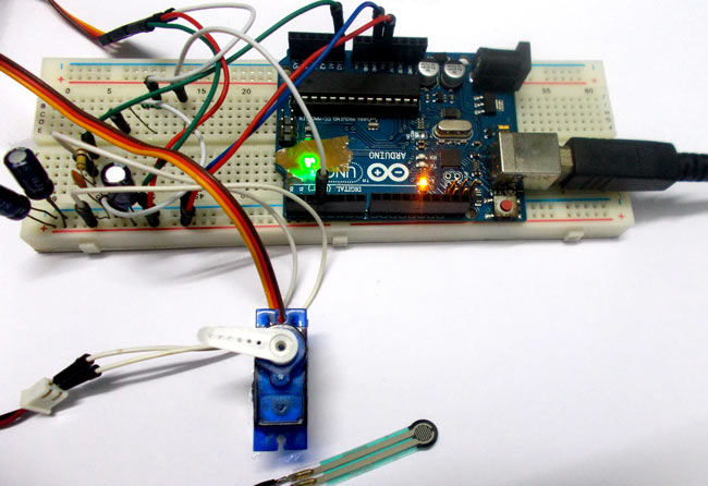 Arduino based Servo Motor Control with Weight (Force Sensor)
