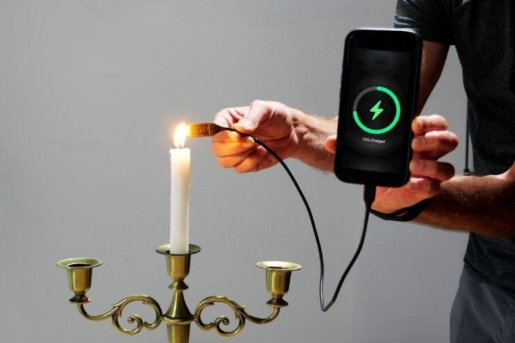 Candle Flame Heats Thermoelectric Generator Charging Smartphone