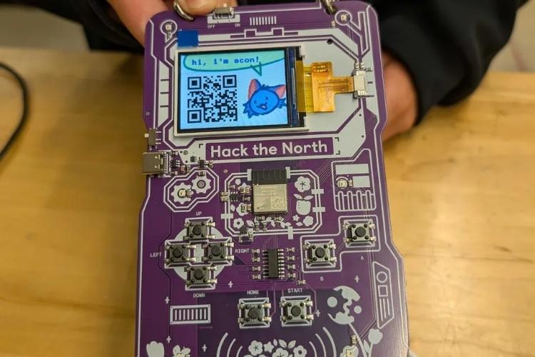 Hackathon Participants Programming ESP32 Badges Running Among