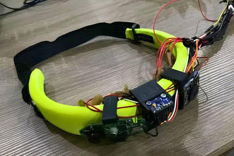 Person Wearing Haptic Headband With Vibration Motors