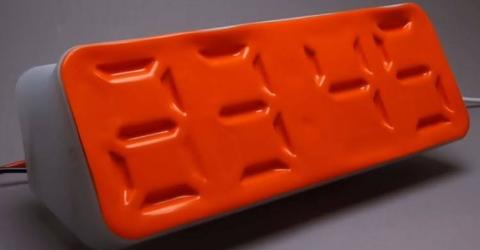 Microfluidic Air Clock with Soft Robotics Design