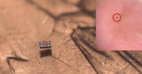 The M3 (Michigan Micro Mote) computer shown on a fingertip for scale