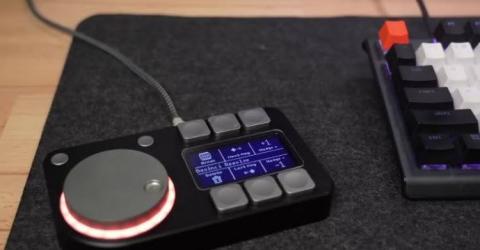 DIY Macro pad with six buttons, an OLED display, and a rotary knob with RGB lighting