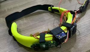 Person Wearing Haptic Headband With Vibration Motors