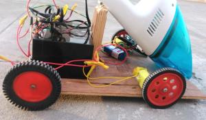 Arduino based Obstacle Avoiding Vacuum Cleaning Robot