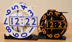 Triaxial Numechron Clock: a unique mechanical clock design