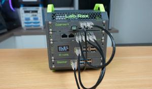 The 3D printed portable homelab with power turned on.