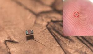 The M3 (Michigan Micro Mote) computer shown on a fingertip for scale