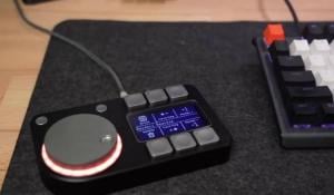 DIY Macro pad with six buttons, an OLED display, and a rotary knob with RGB lighting