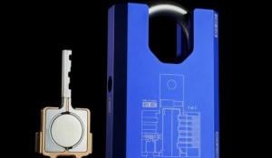 A close-up of a futuristic mechanical padlock designed by Shane Wighton